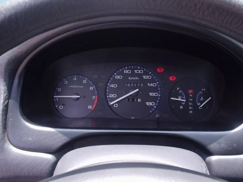 Автомобиль Isuzu Gemini V Седан