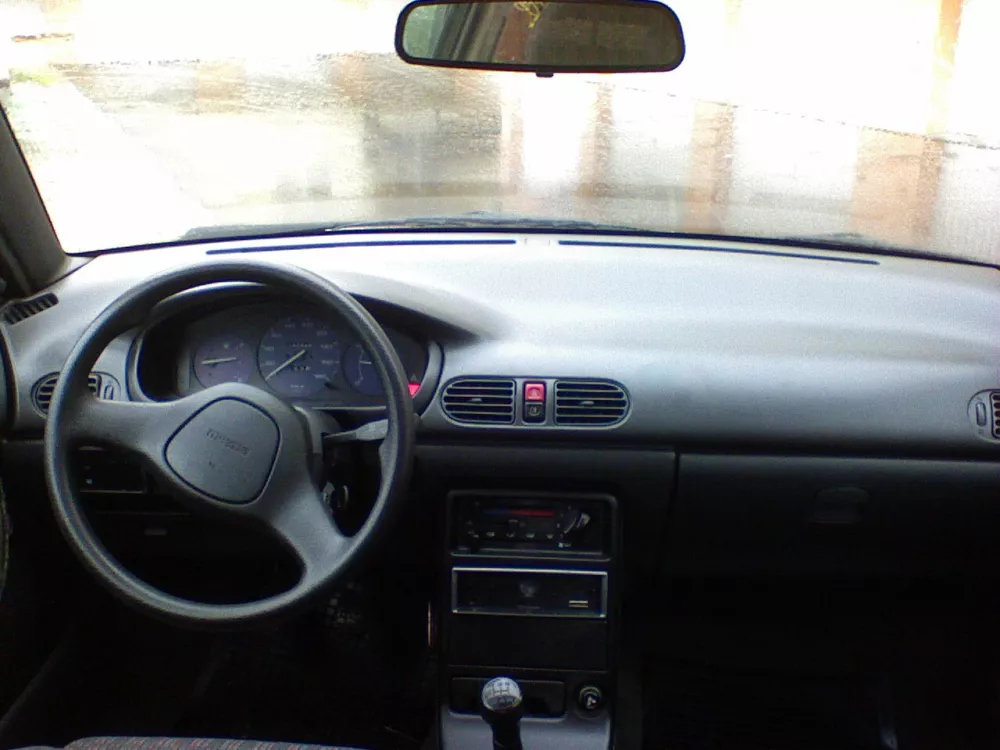 Автомобиль Mazda 121 III Хэтчбек (3 двери)