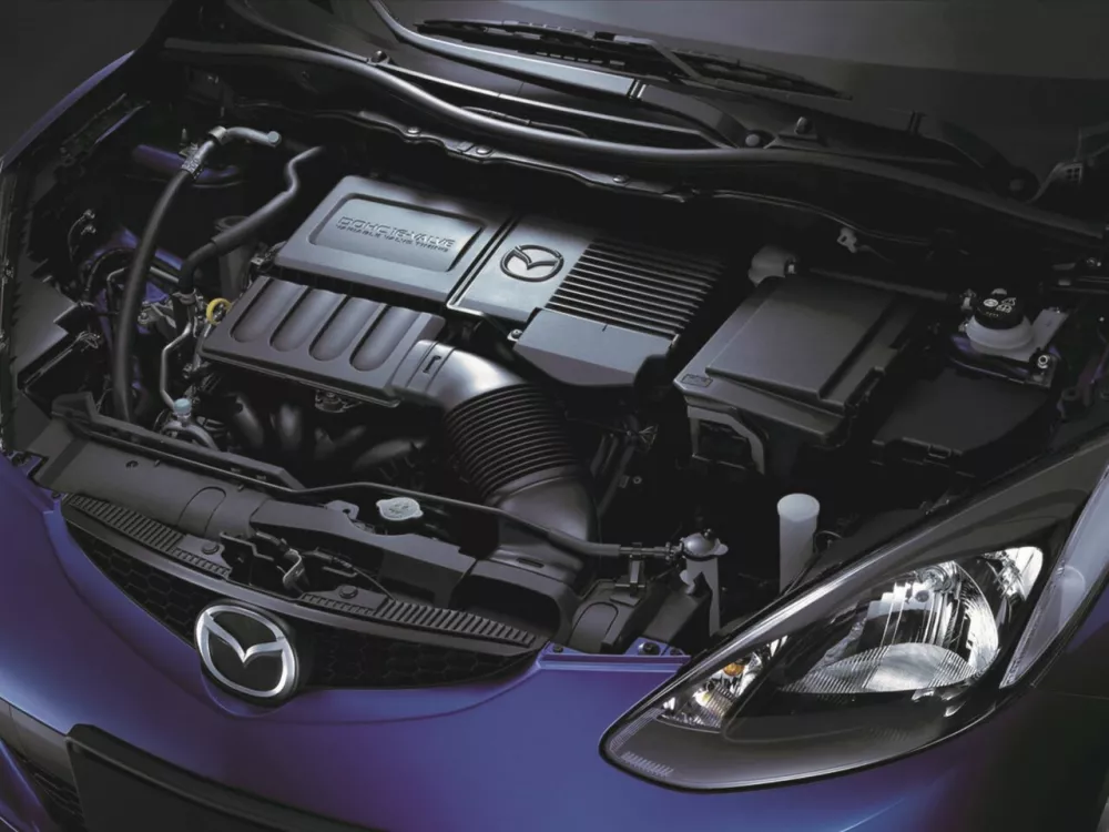 Автомобиль Mazda 2 II (DE) Седан