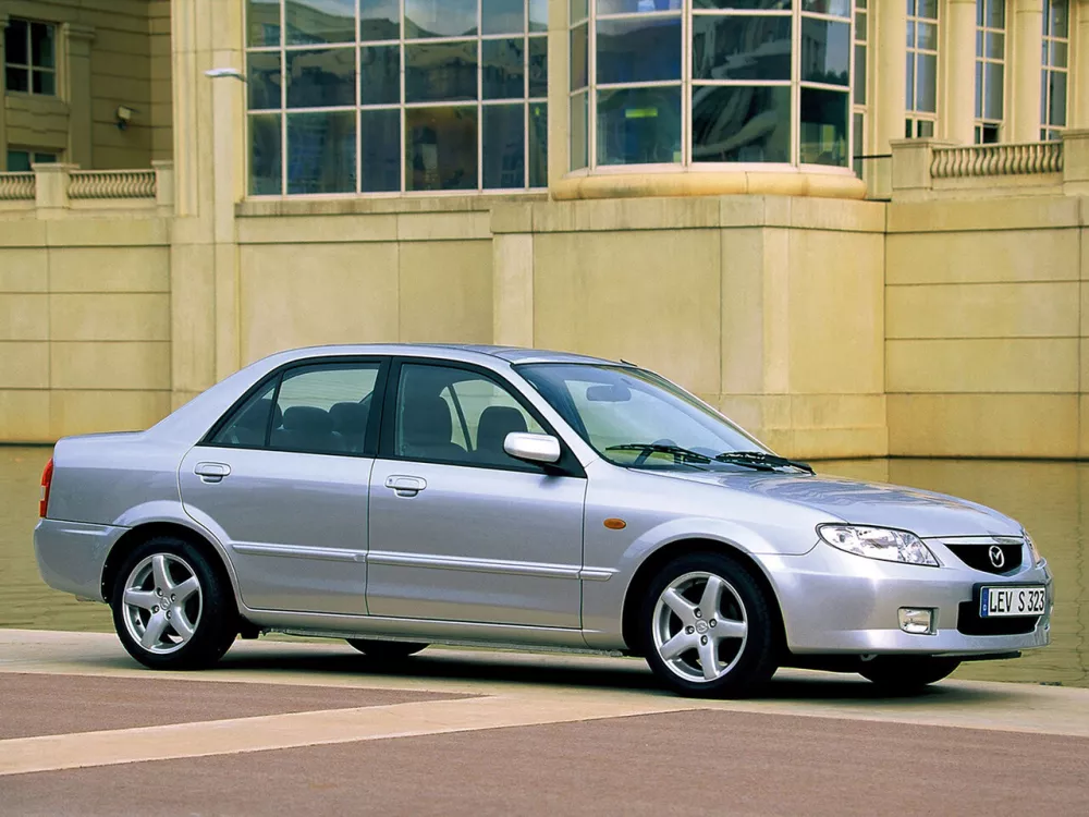 Автомобиль Mazda 323 VI (BJ) Рестайлинг Седан