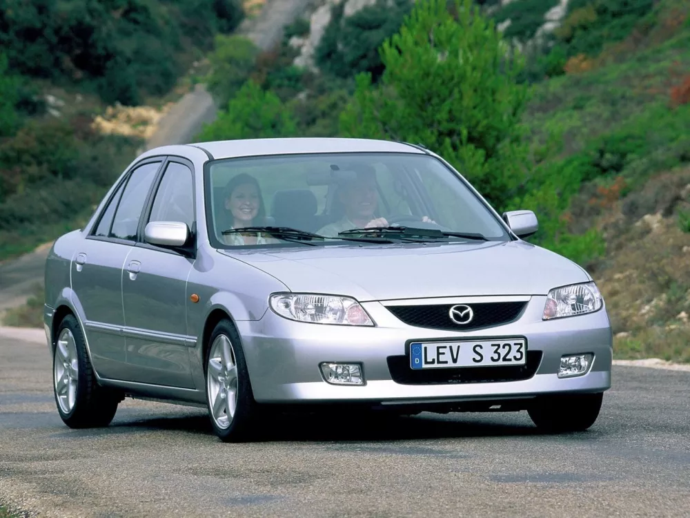 Автомобиль Mazda 323 VI (BJ) Рестайлинг Седан