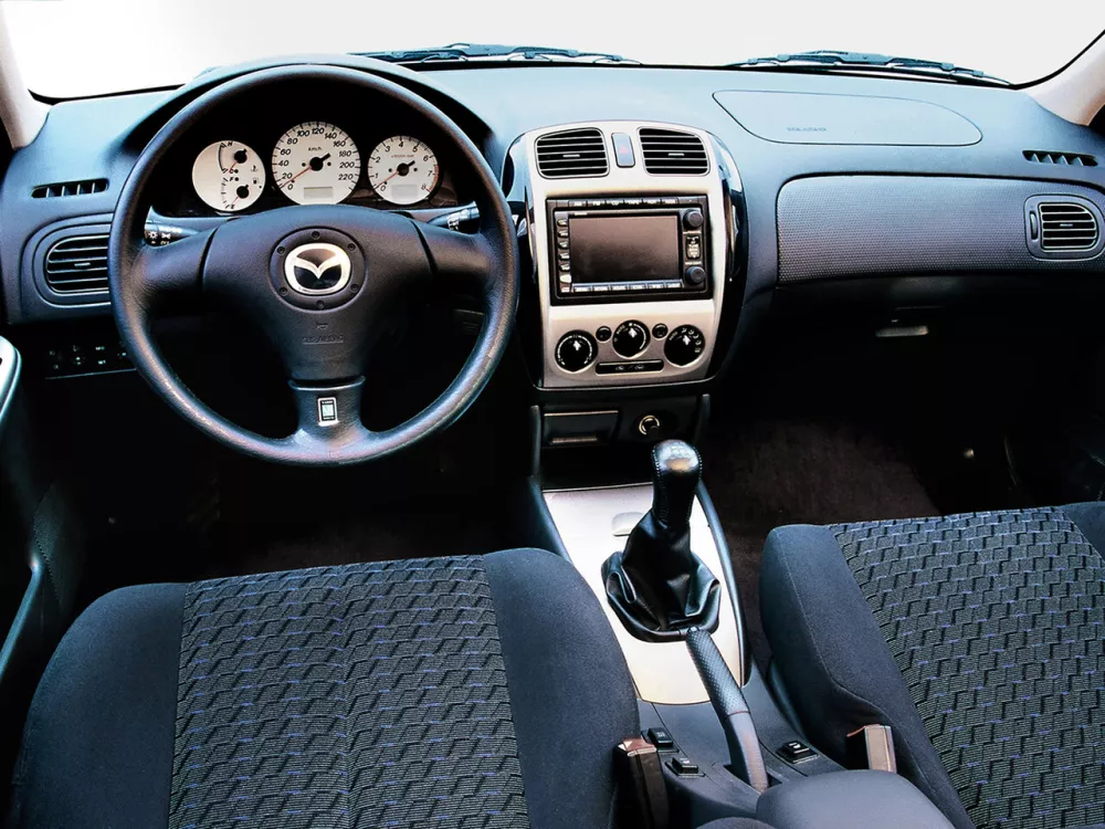 Автомобиль Mazda 323 VI (BJ) Рестайлинг Седан