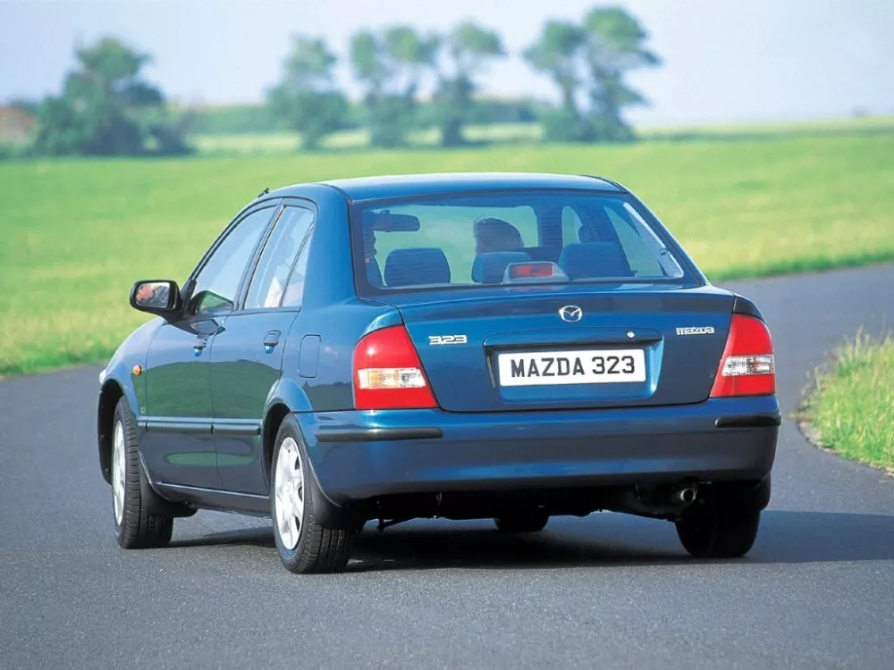 Автомобиль Mazda 323 VI (BJ) Седан