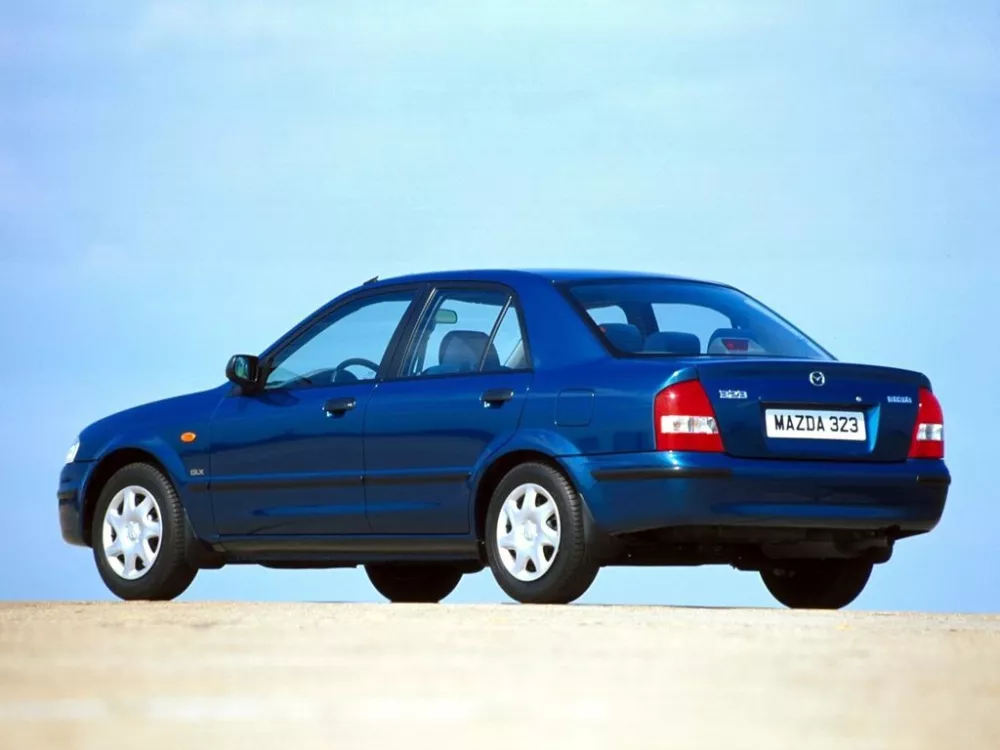 Автомобиль Mazda 323 VI (BJ) Седан