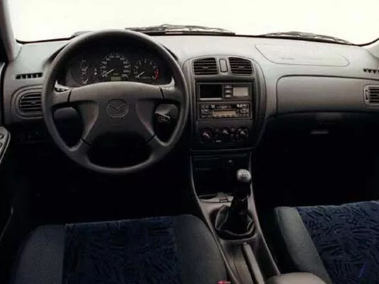 Автомобиль Mazda 323 V (BA) Седан