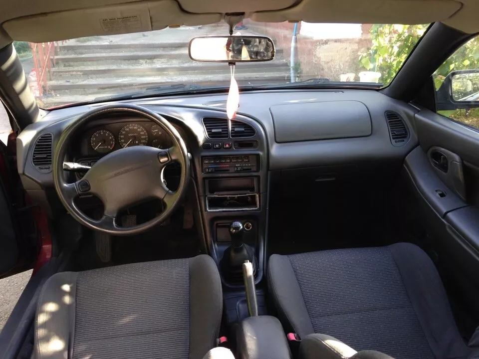 Автомобиль Mazda 323 V (BA) Хэтчбек (5 дверей)