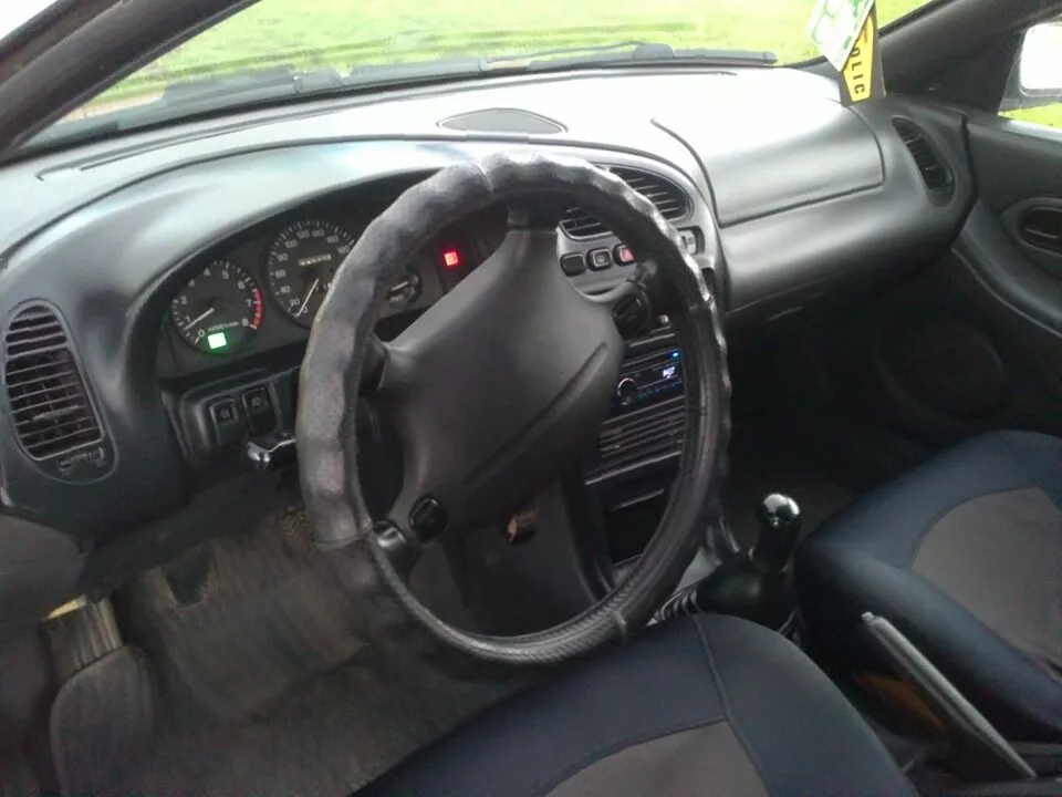 Автомобиль Mazda 323 V (BA) Хэтчбек (5 дверей)