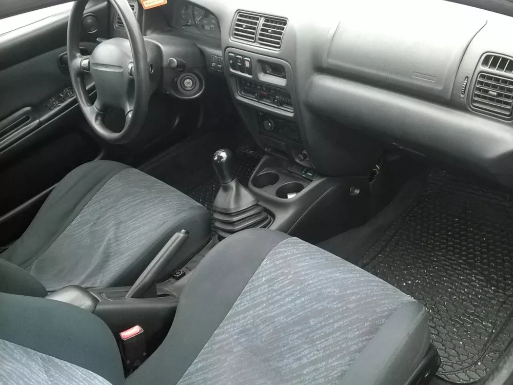 Автомобиль Mazda 323 V (BA) Хэтчбек (3 двери)