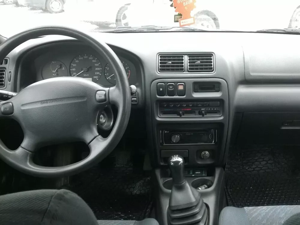 Автомобиль Mazda 323 V (BA) Хэтчбек (3 двери)
