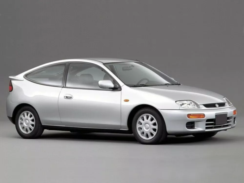 Автомобиль Mazda 323 V (BA) Купе C