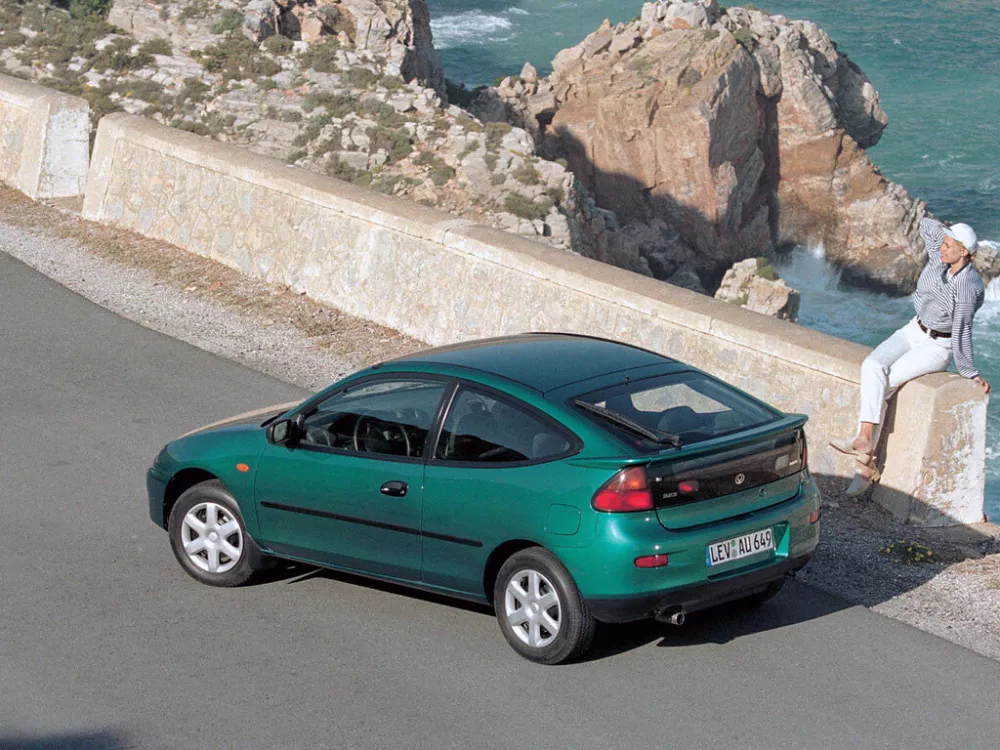 Автомобиль Mazda 323 V (BA) Купе C