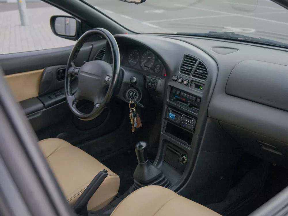 Автомобиль Mazda 323 V (BA) Купе C