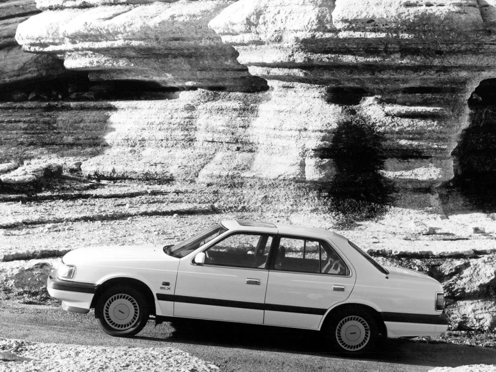 Автомобиль Mazda 929 III (HC) Седан