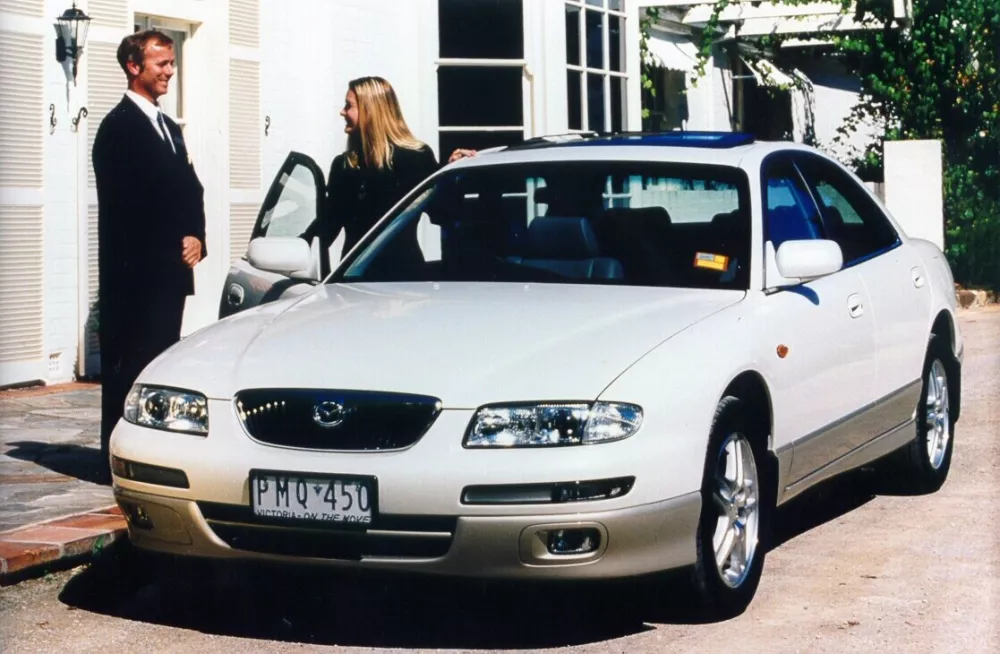 Автомобиль Mazda Eunos 800 Седан