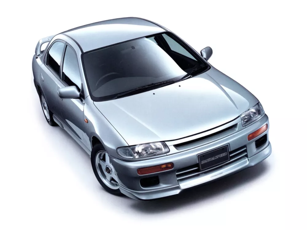 Автомобиль Mazda Familia VII (BH) Седан