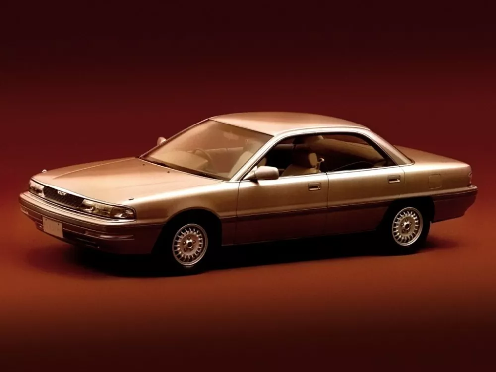 Автомобиль Mazda Persona Седан