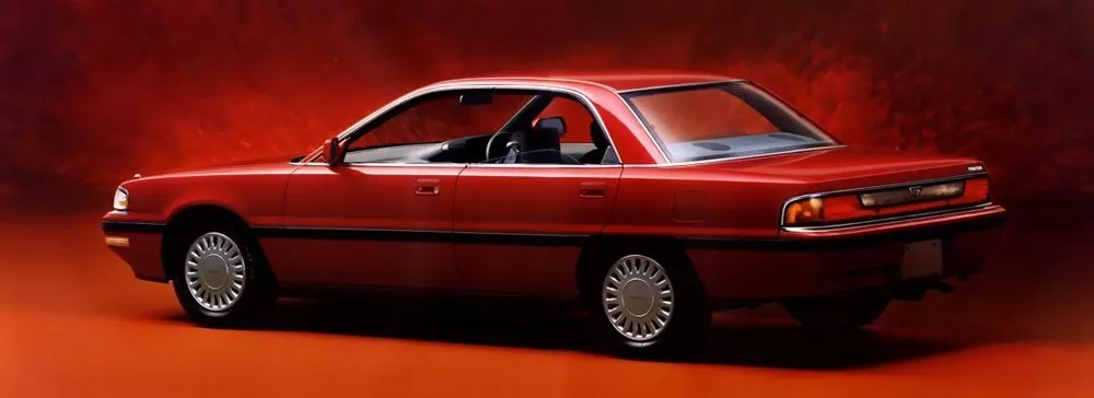 Автомобиль Mazda Persona Седан