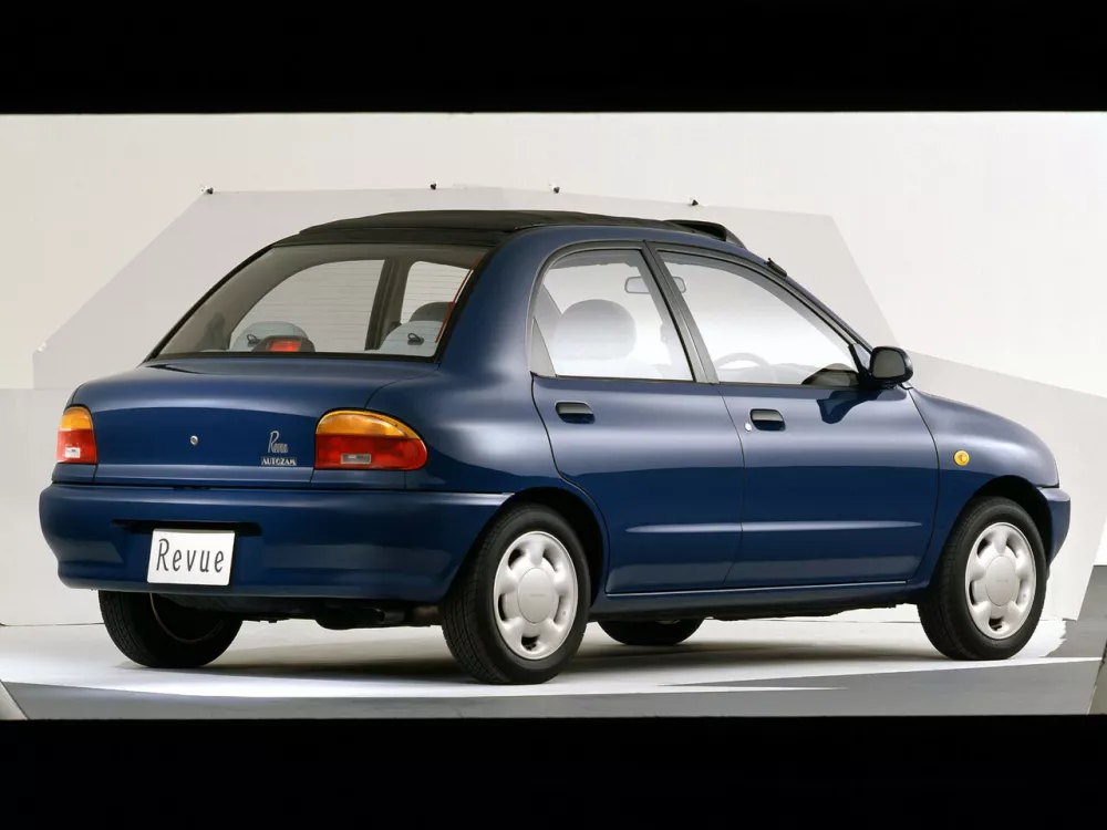 Автомобиль Mazda Revue Седан