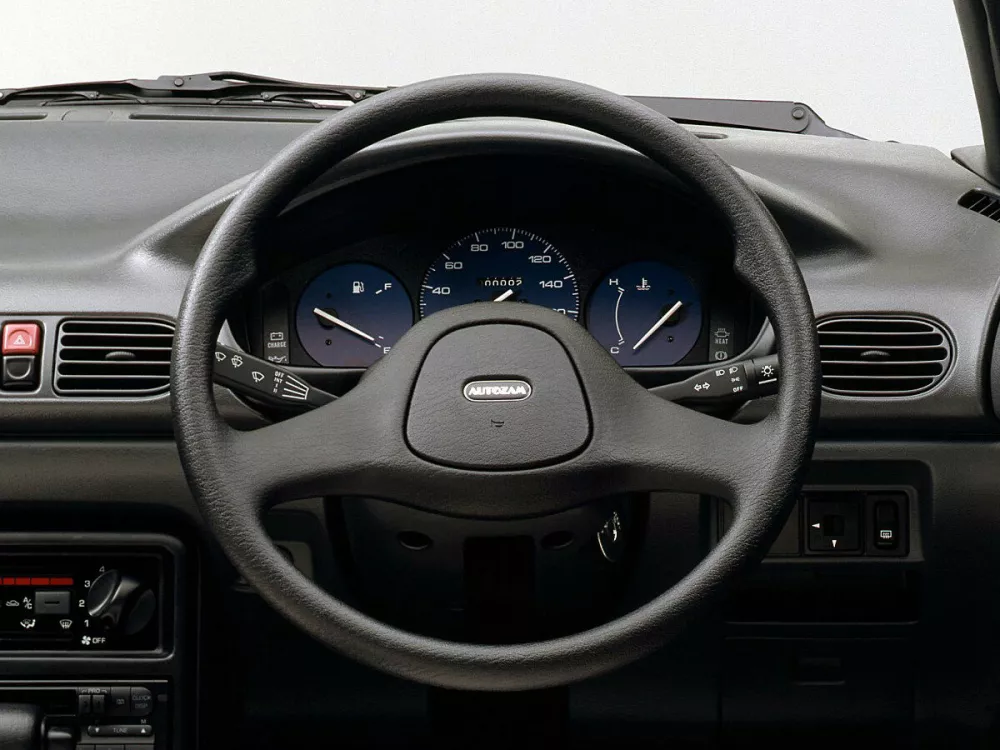 Автомобиль Mazda Revue Седан