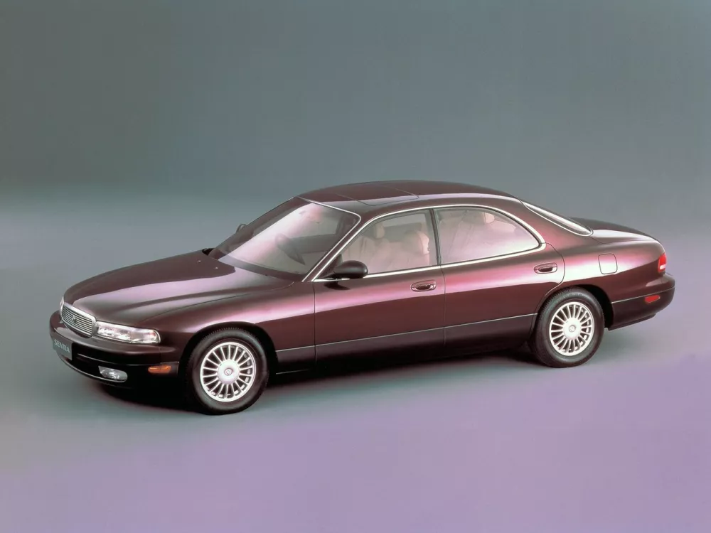 Автомобиль Mazda Sentia I (HD) Седан