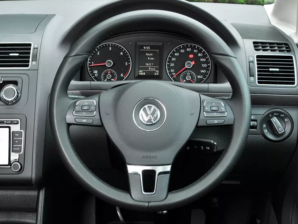 Автомобиль Volkswagen Touran I Рестайлинг 2 Компактвэн Cross